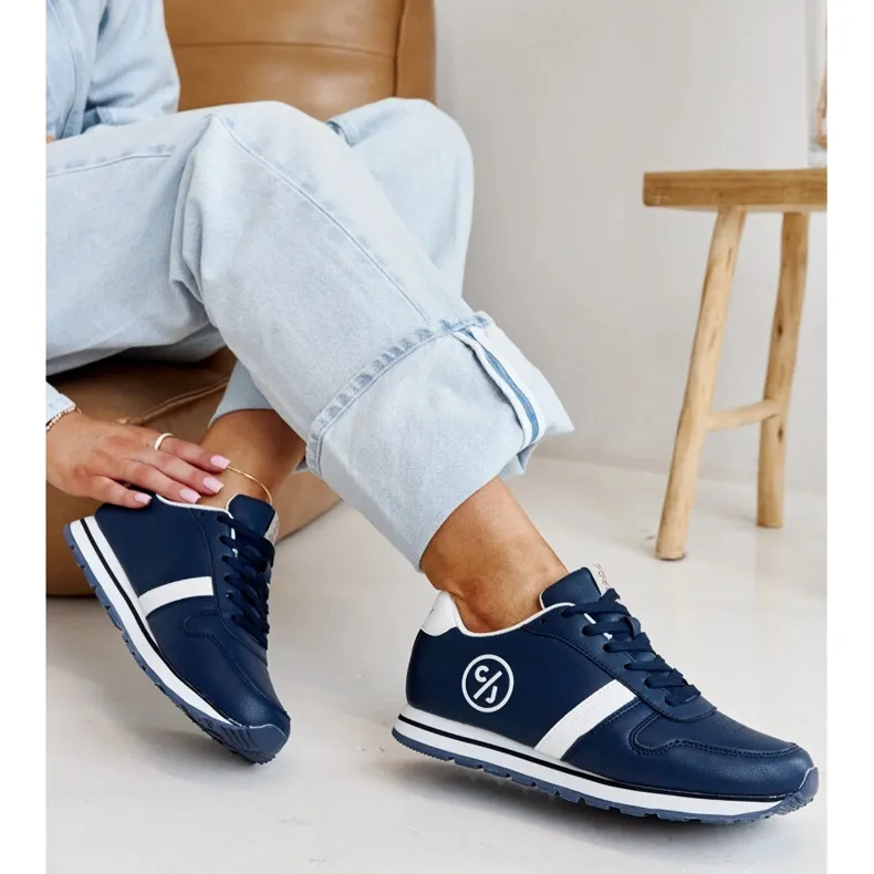 Navy blue women's sneakers by Cross Jeans