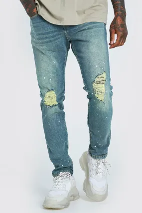 Skinny Ripped Knee Paint Splat Zip Jeans