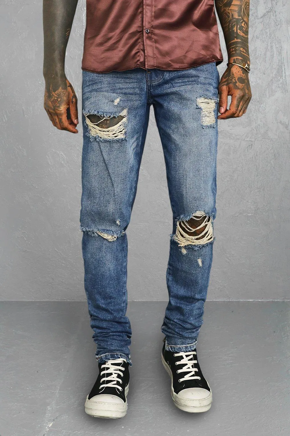 Tapered Stacked Exploded Knee Jeans