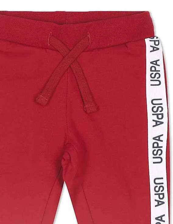 U.S. Polo Assn. Kids Girls Red Mid Rise Solid Joggers