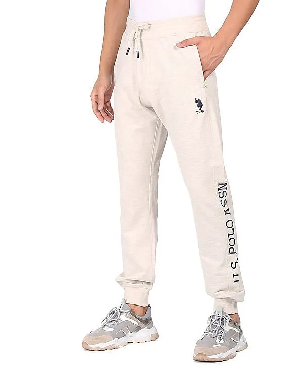 U.S. Polo Assn. Men Ecru Mid Rise Solid Joggers