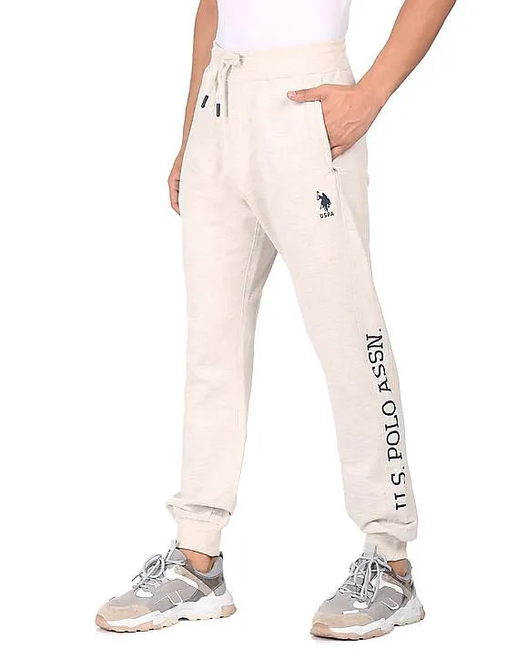 U.S. Polo Assn. Men Ecru Mid Rise Solid Joggers