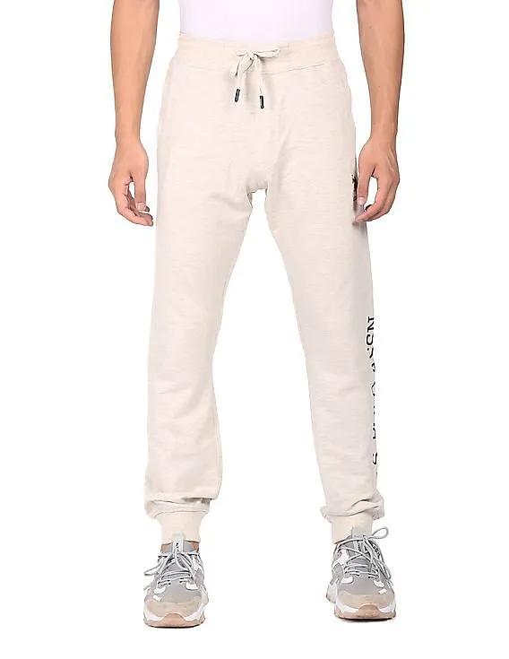 U.S. Polo Assn. Men Ecru Mid Rise Solid Joggers