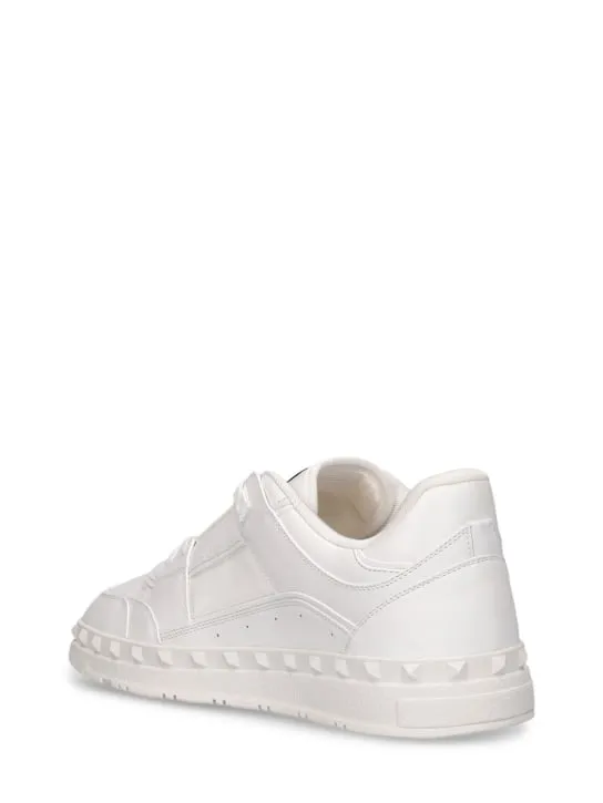 Valentino Garavani   Freedots leather low top sneakers 