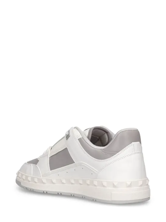 Valentino Garavani   Freedots leather low top sneakers 